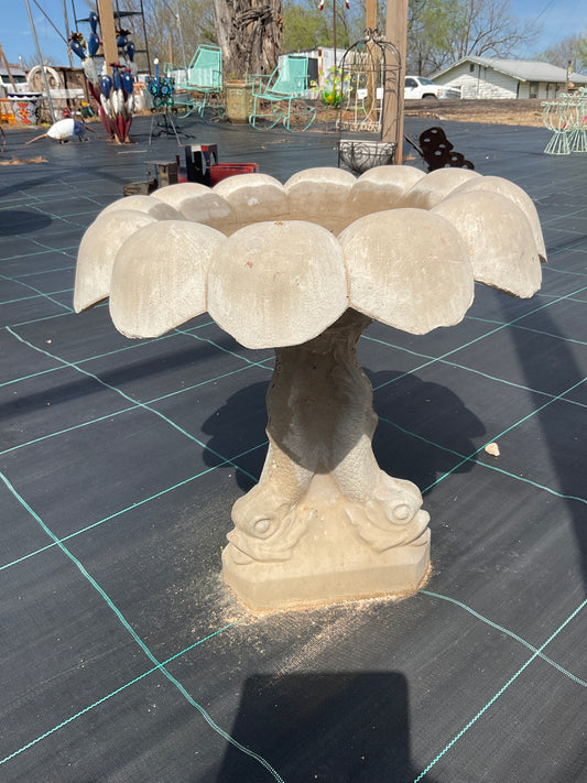 Small concrete birdbath