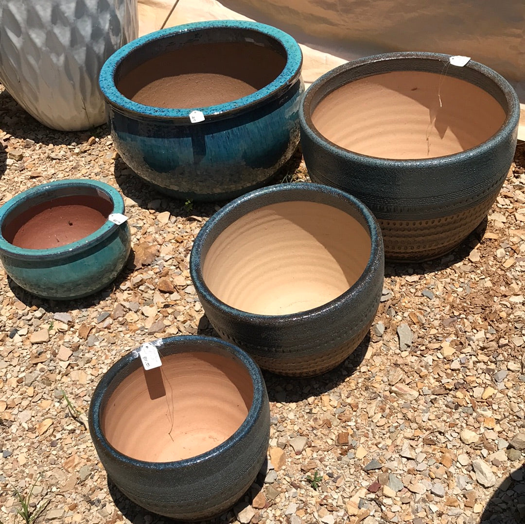 Flat round planters
