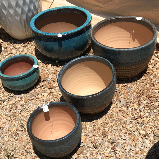 Flat round planters