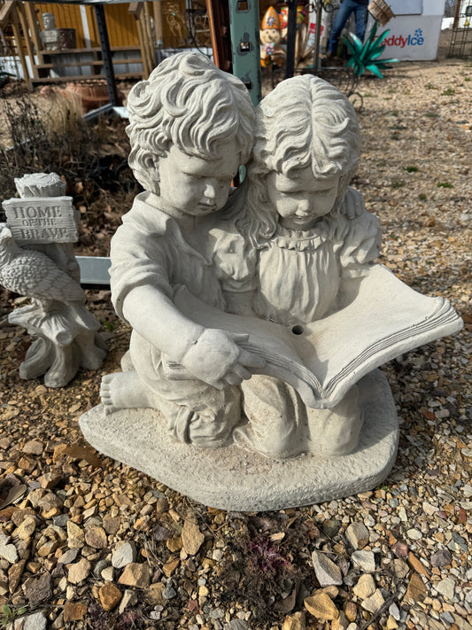 Boy & Girl w/book concrete